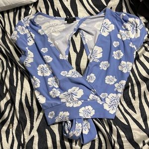 Light blue crop top with white hibiscus details